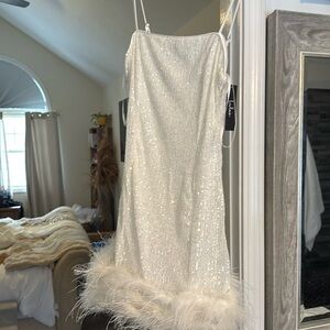 Bought this white sequence, feather dress for my bachelorette party unworn